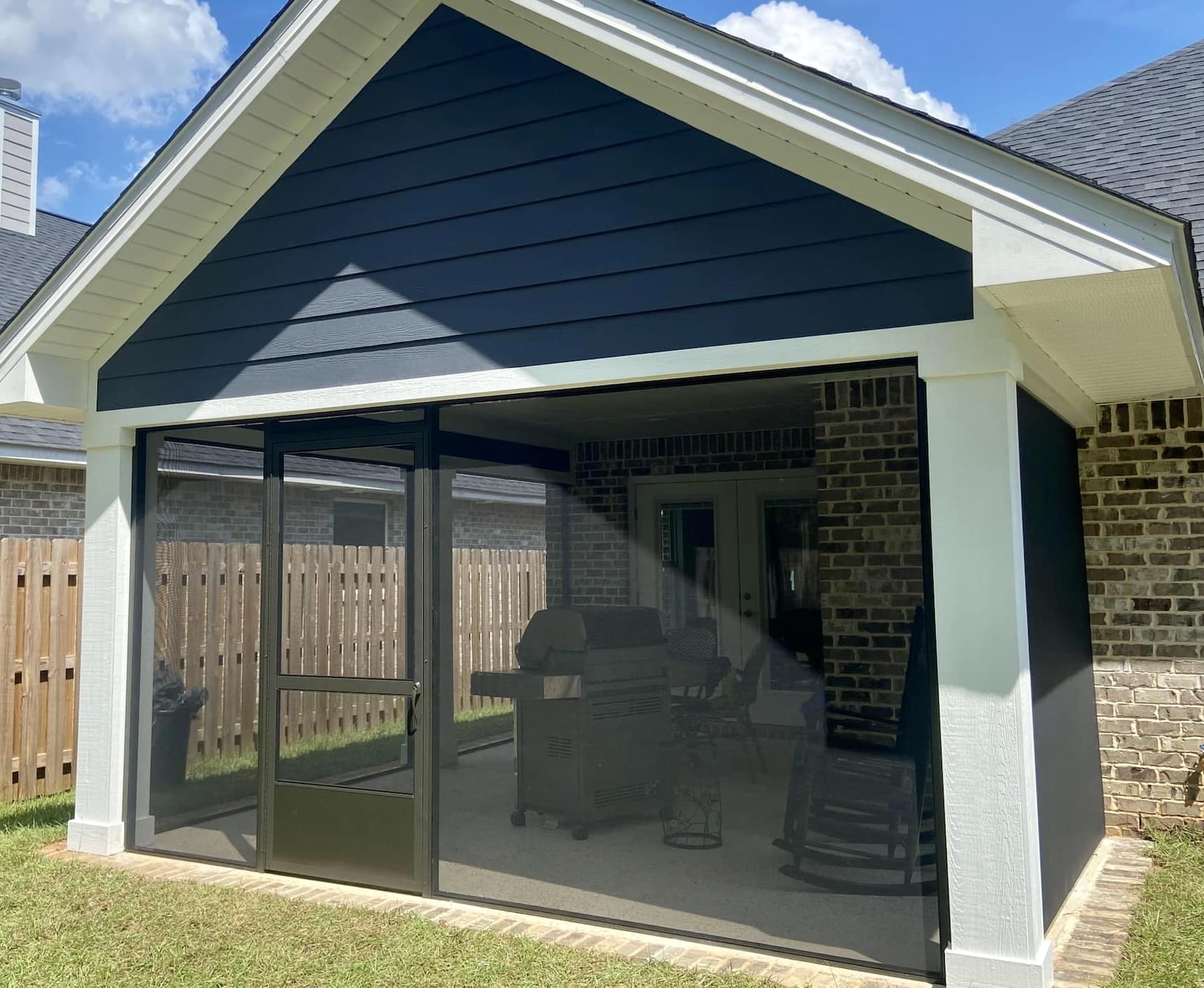 newly installed screen enclosure in a patio